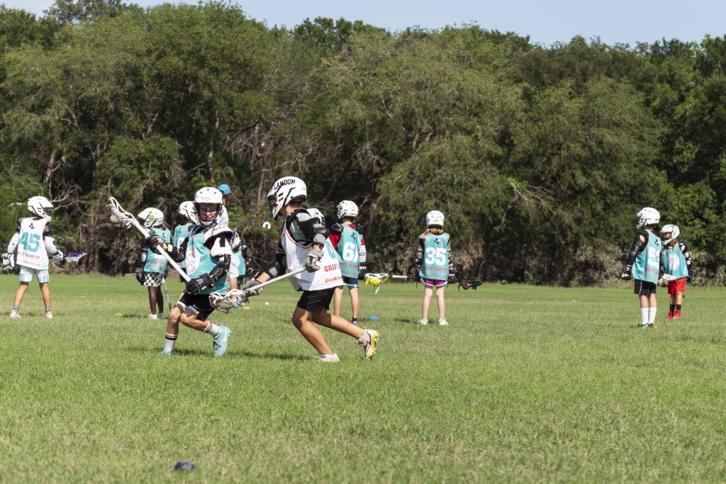 Youth lacrosse game action in San Antonio