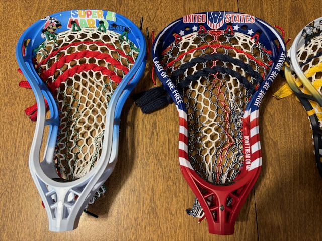 Custom strung lacrosse head — a past Summer Showdown camp prize