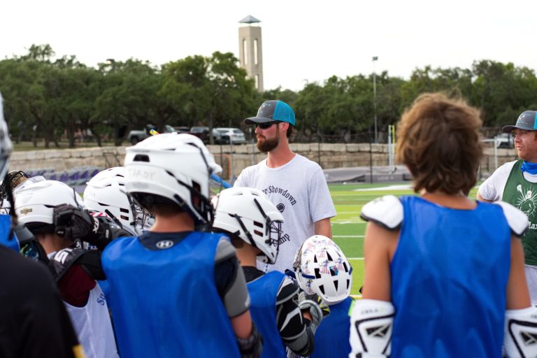 Coach Paul with his college lacrosse team on campus