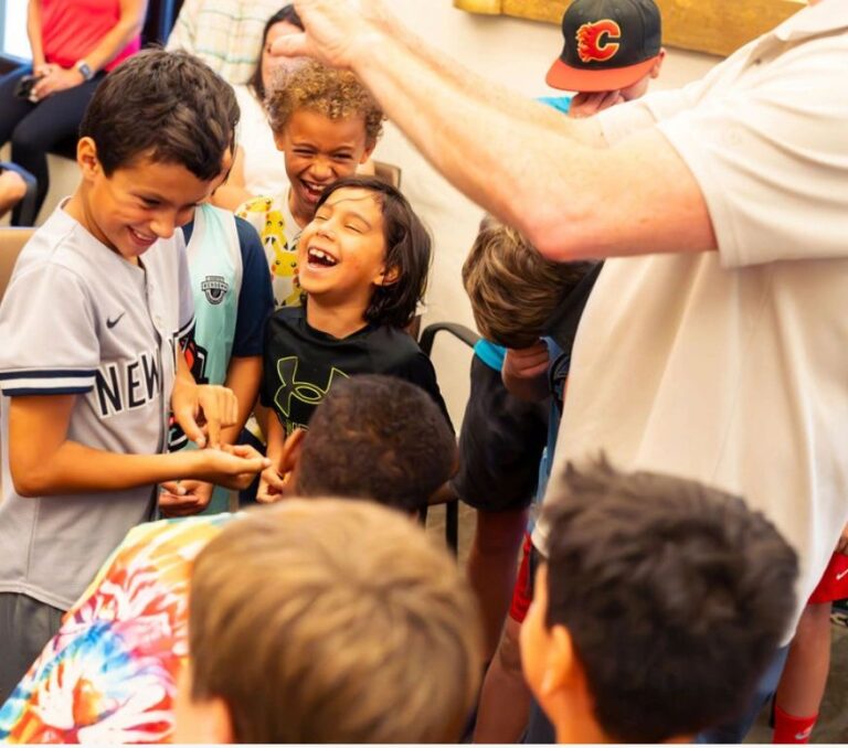 SA Armadillos players celebrating together after a youth lacrosse game